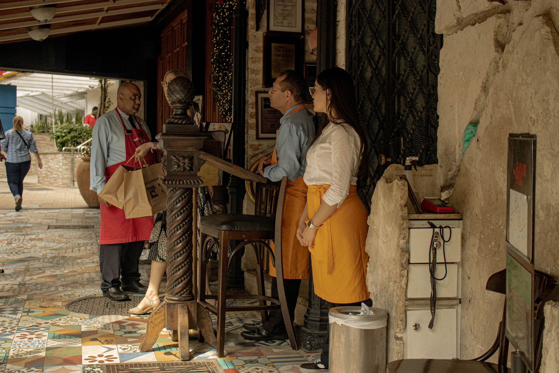 Hospitality staff welcoming customers